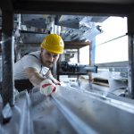 factory-worker-working-warehouse-handling-metal-material-production